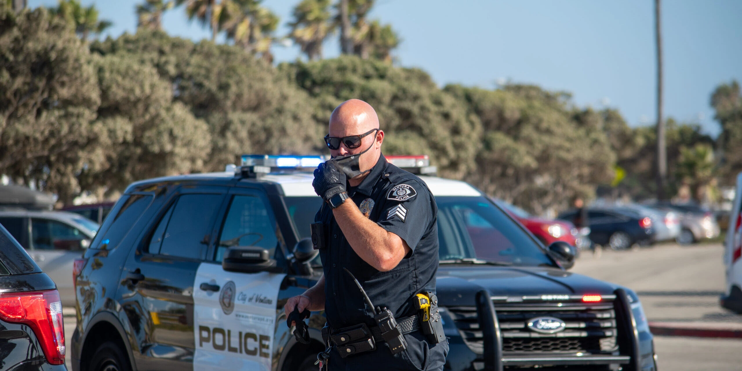 Police with Motorola APX-radio scaled - public-security